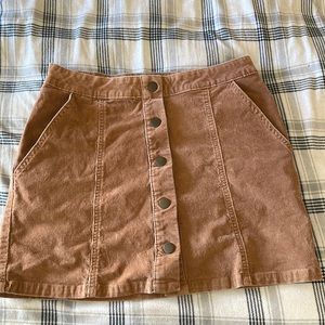 Button mini skirt size small. Excellent condition. Stretchy & slimming